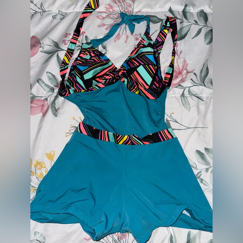 Never worn unique one piece swimsuit size s
